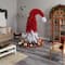 9ft. Pre-Lit Holiday Red Santa Hat Artificial Christmas Tree, White LED Lights